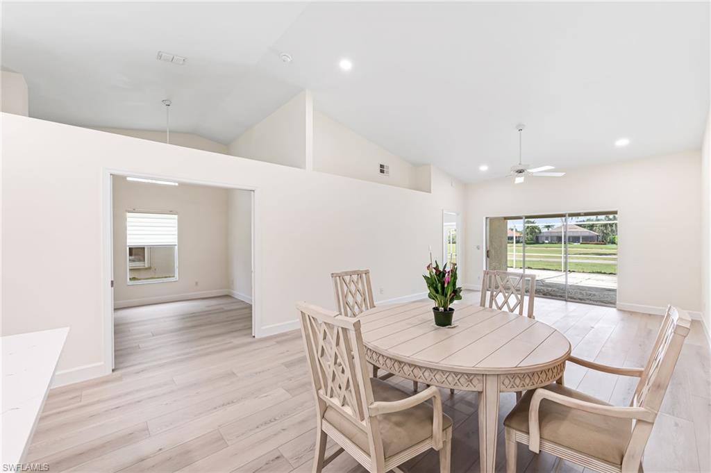 8562 Mustang Drive, Unit 31 Naples, FL 34113 - Photo 9 of 44 Dining space with recessed lighting, light wood-style floors, visible vents, and ceiling fan