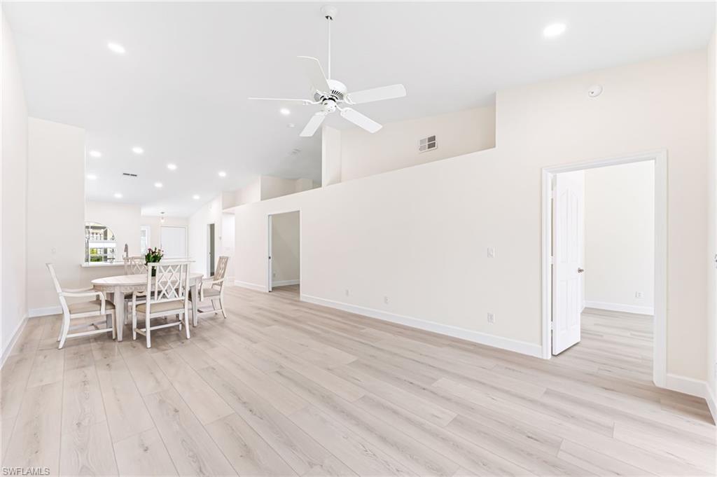 8562 Mustang Drive, Unit 31 Naples, FL 34113 - Photo 10 of 44 Living area with baseboards, light wood-style flooring, visible vents, and ceiling fan