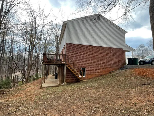 a house with trees in front of it