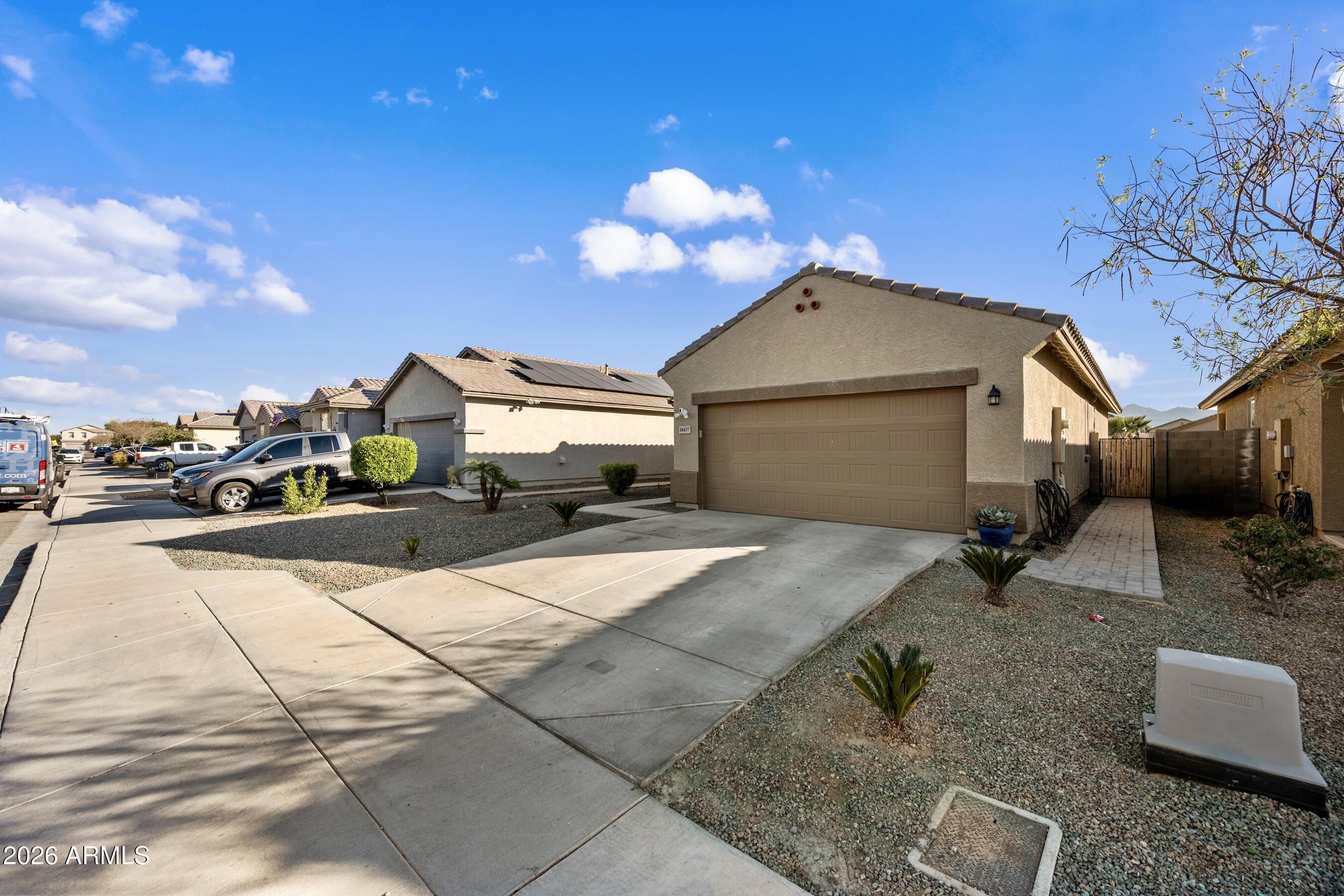 10437 West Cordes Road Tolleson, AZ 85353 - Photo 2 of 39 2 Car Garage