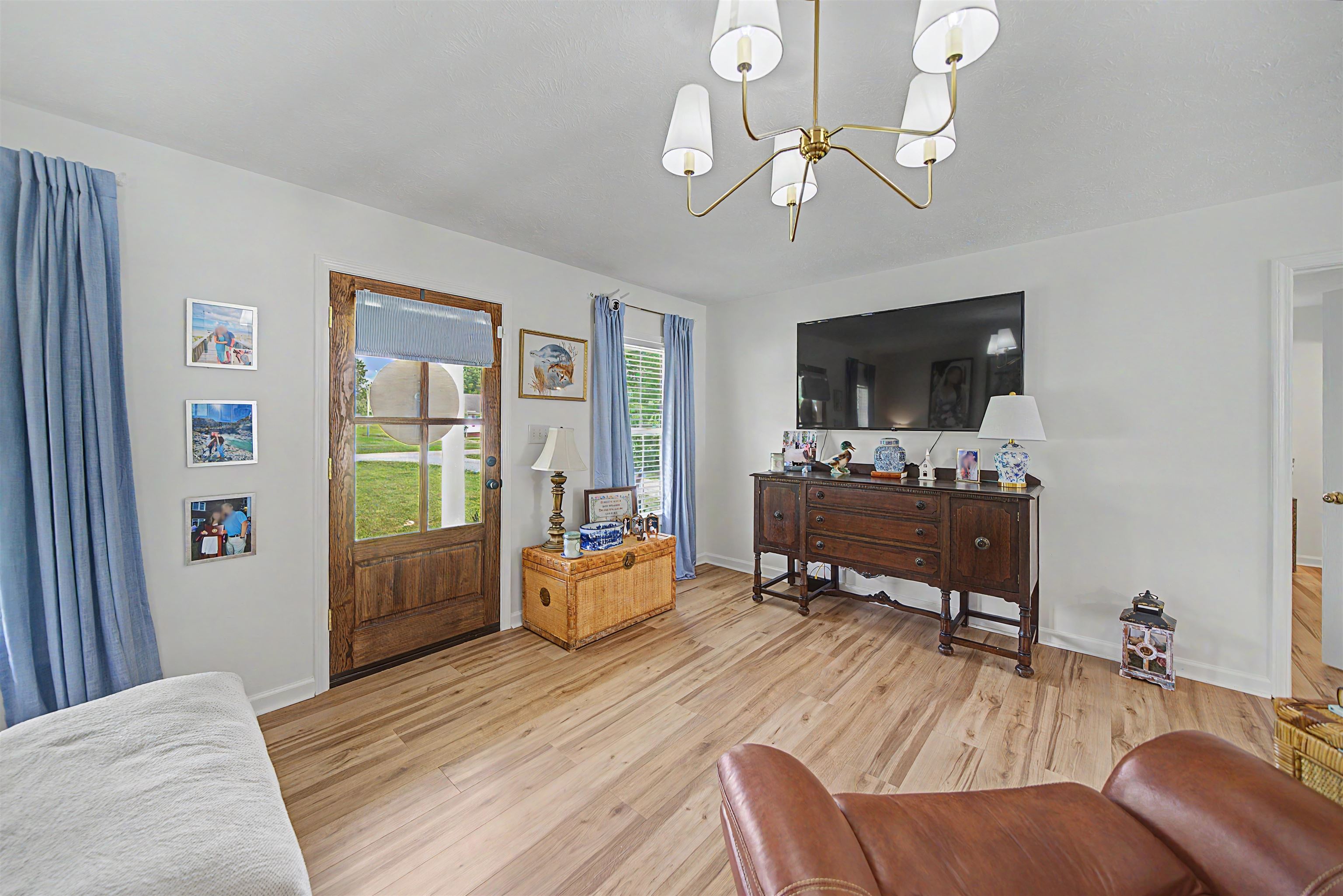 18 Eric Lane Ramer, TN 38367 - Photo 13 of 25 a bedroom with furniture and a flat screen tv