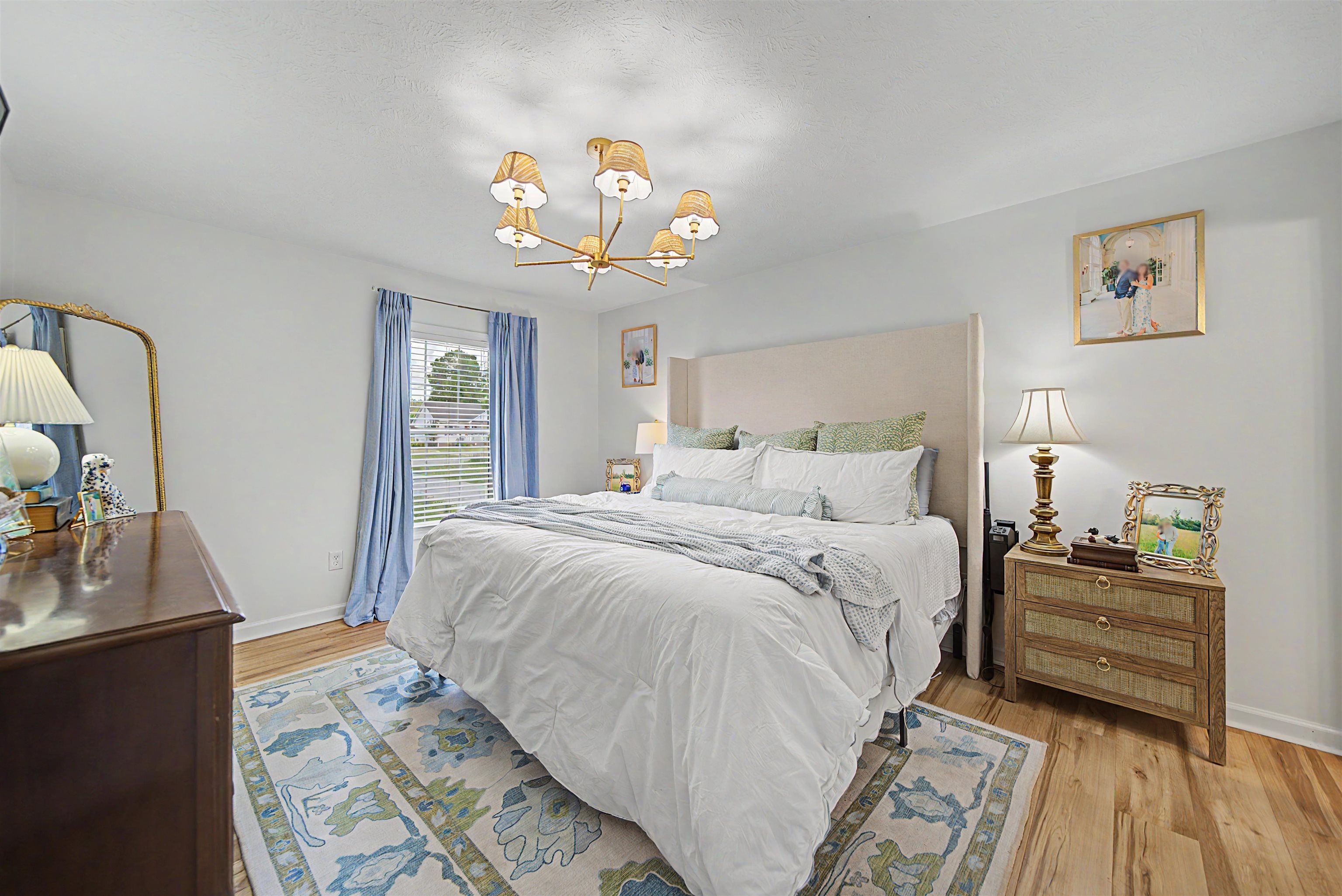 18 Eric Lane Ramer, TN 38367 - Photo 20 of 25 a bedroom with bed and wooden floor