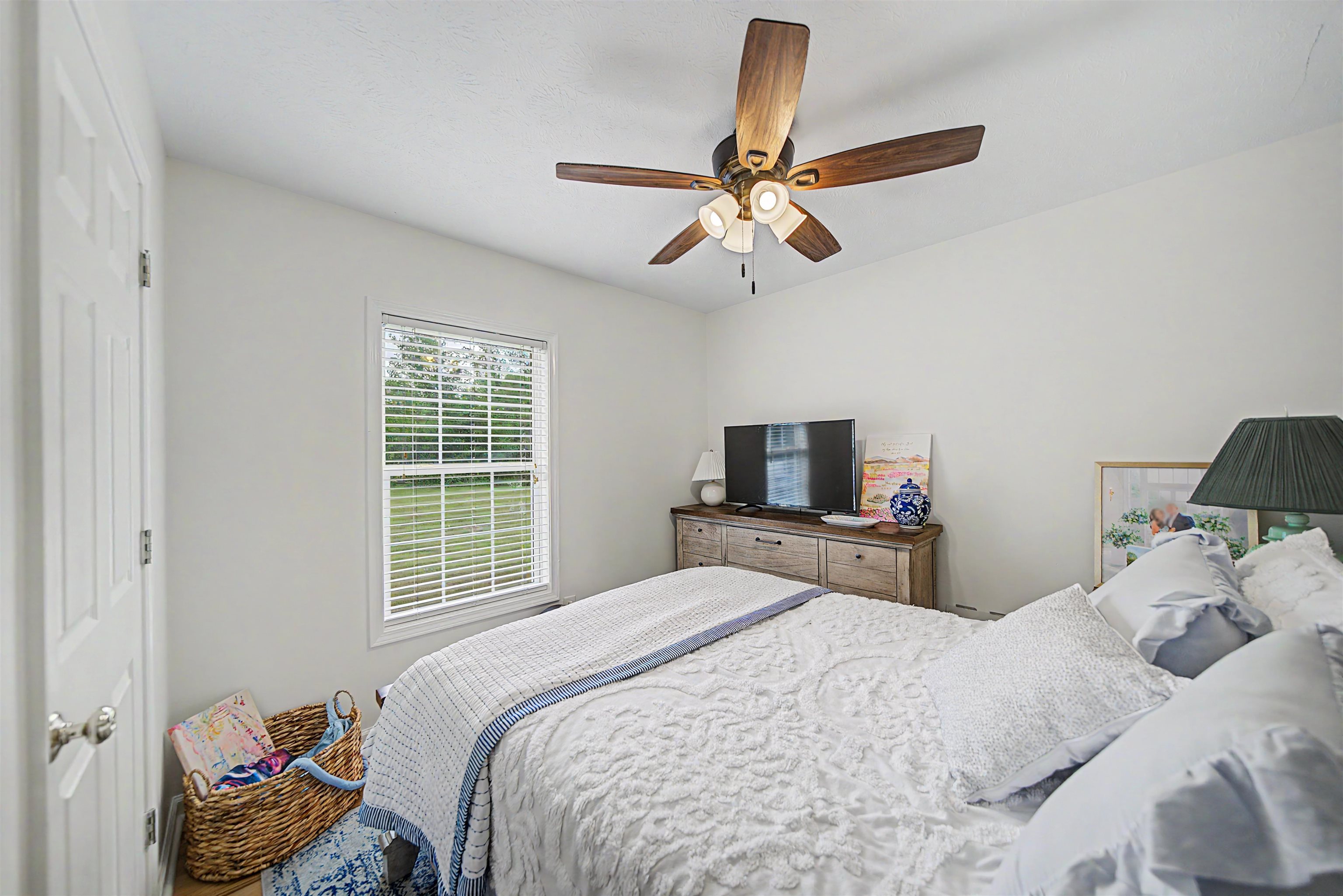 18 Eric Lane Ramer, TN 38367 - Photo 24 of 25 a bedroom with a bed and a window