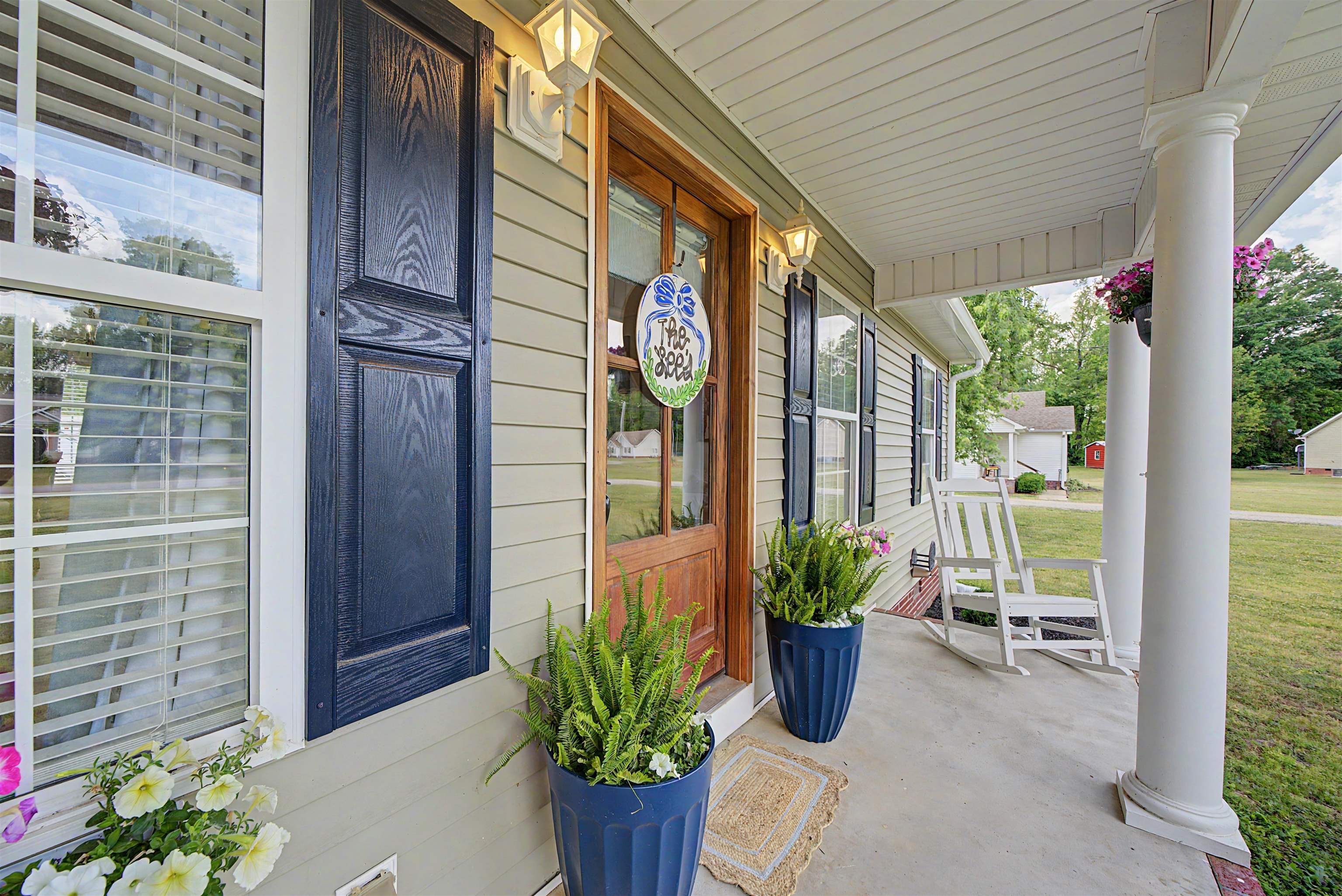 18 Eric Lane Ramer, TN 38367 - Photo 5 of 25 a potted plant sitting in front of a house