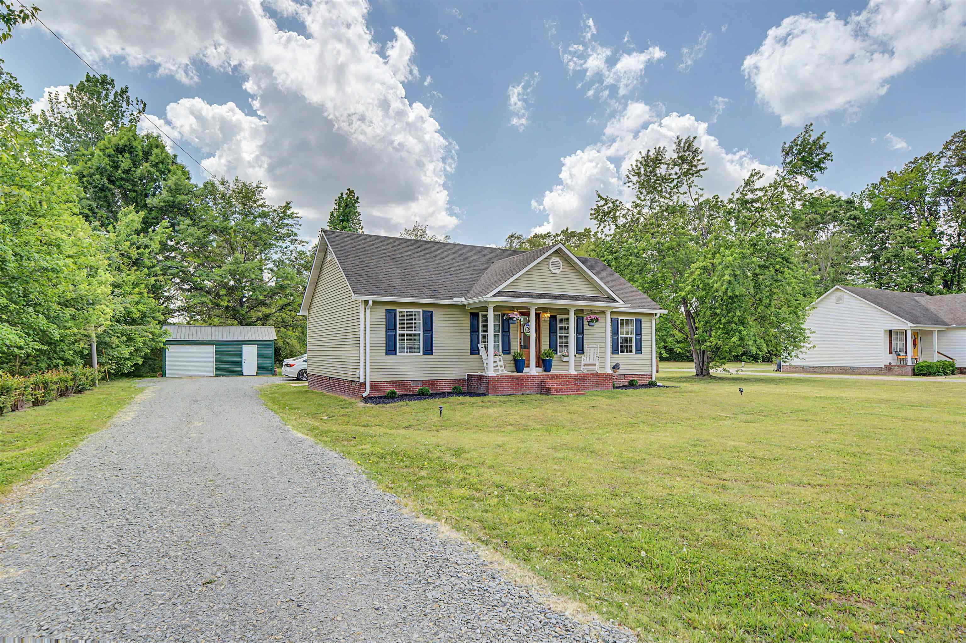 18 Eric Lane Ramer, TN 38367 - Photo 7 of 25 a front view of a house with garden