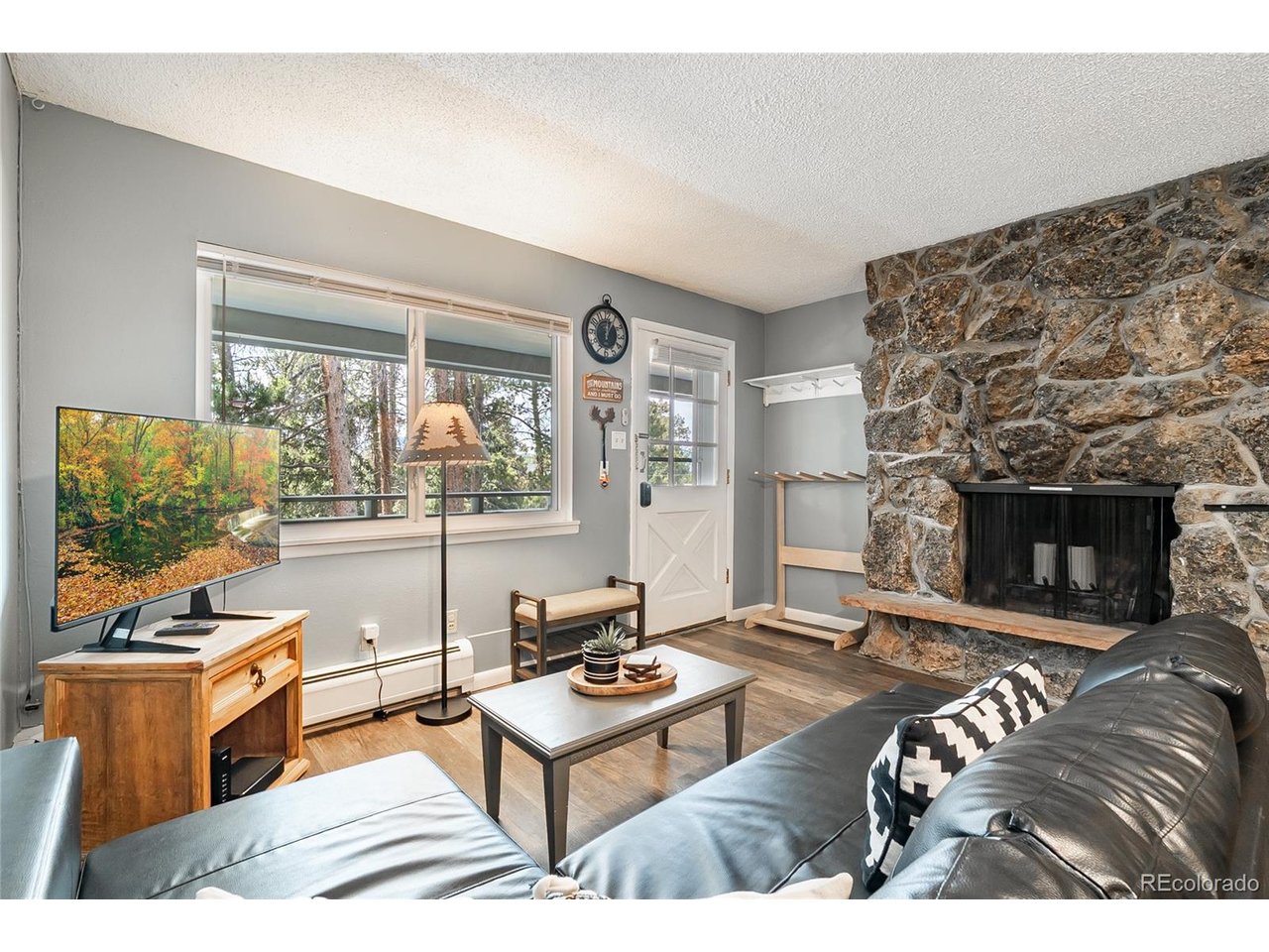 400 Hi Country Drive, Unit 15 Winter Park, CO 80482 - Photo 2 of 35 Relax in the tree-tops or fireside after a long day exploring Winter Park and Grand County