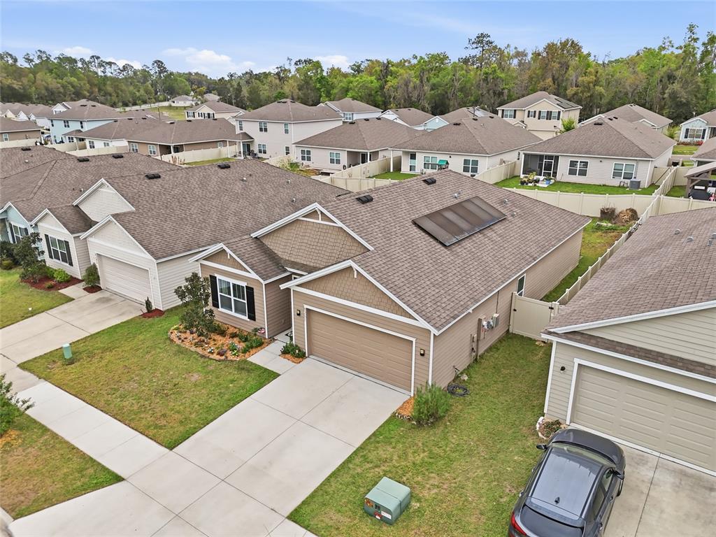8261 Southwest 60th Avenue Gainesville, FL 32608 - Photo 3 of 34 an aerial view of residential houses with outdoor space