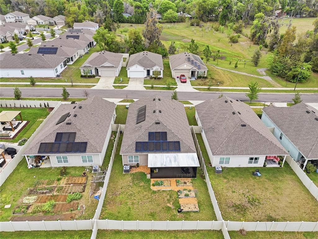 8261 Southwest 60th Avenue Gainesville, FL 32608 - Photo 4 of 34 an aerial view of a house with swimming pool