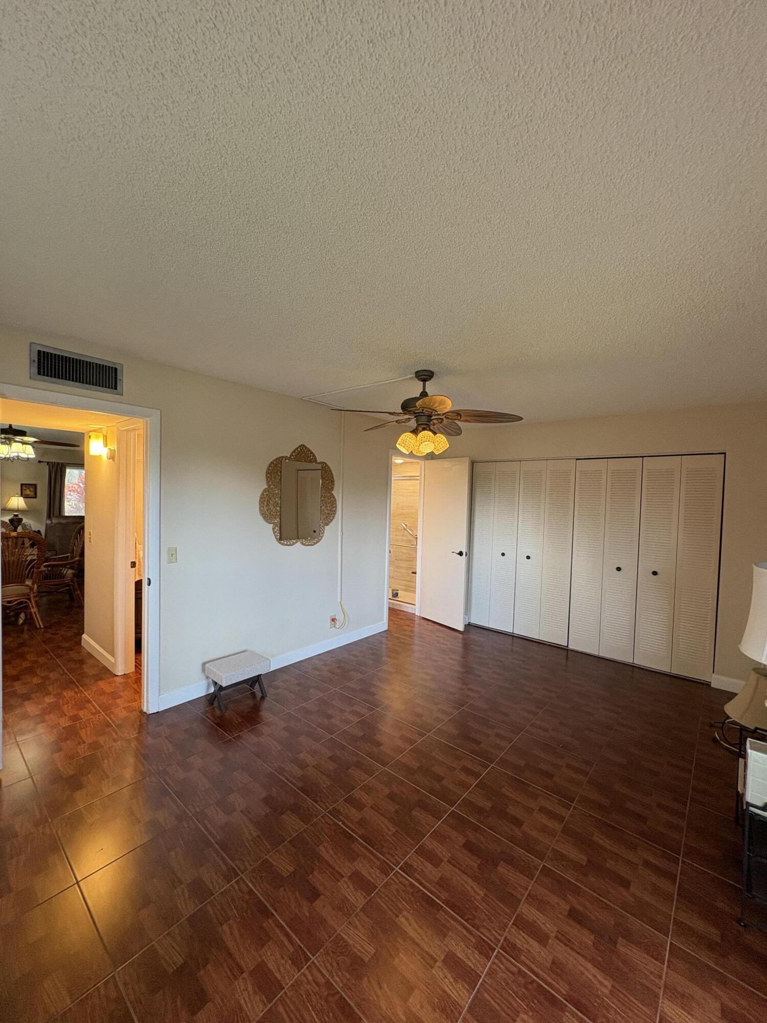 23 Flanders A Delray Beach, FL 33484 - Photo 15 of 21 an empty room with a empty space and windows