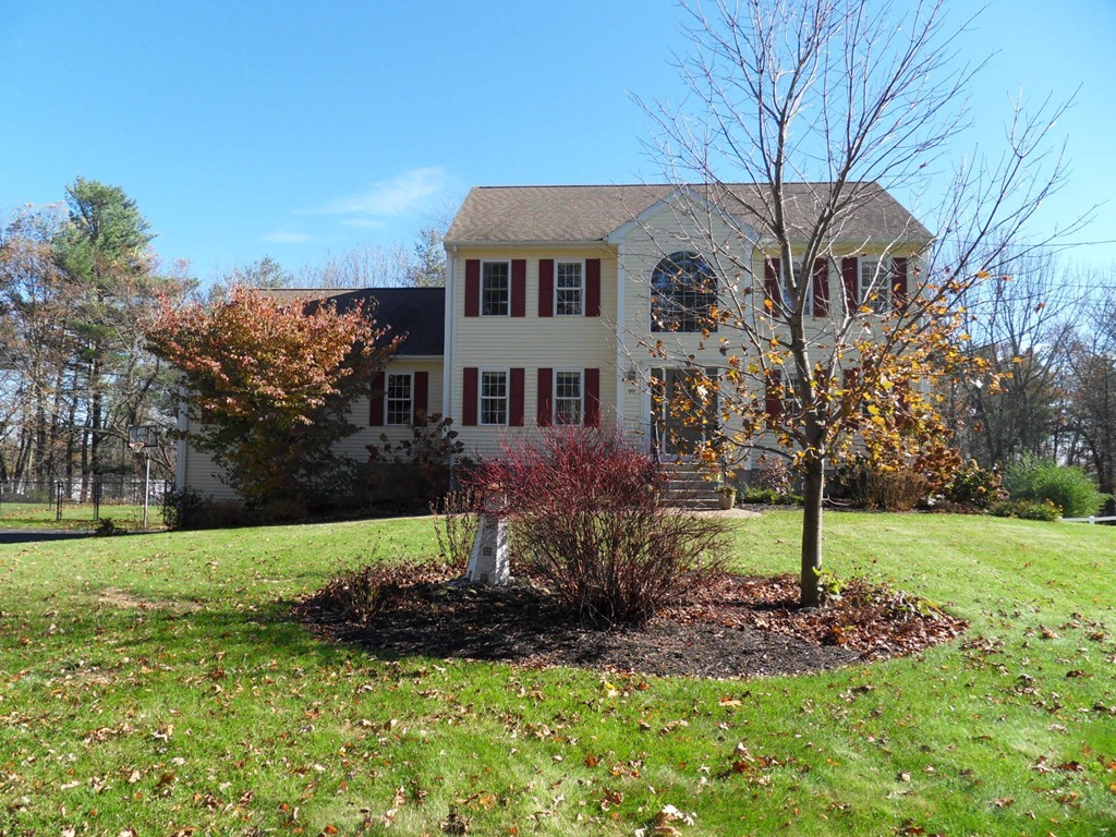99 Freeman Road Charlton, MA 01507 - Photo 1 of 29 a view of a house with a yard