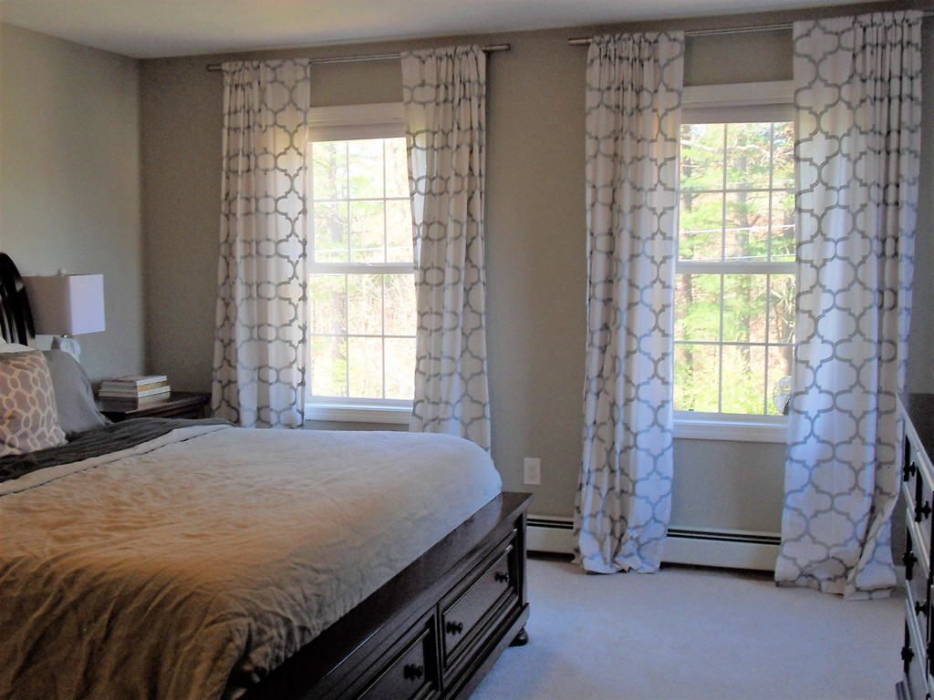 99 Freeman Road Charlton, MA 01507 - Photo 19 of 29 a bedroom with a bed and a window