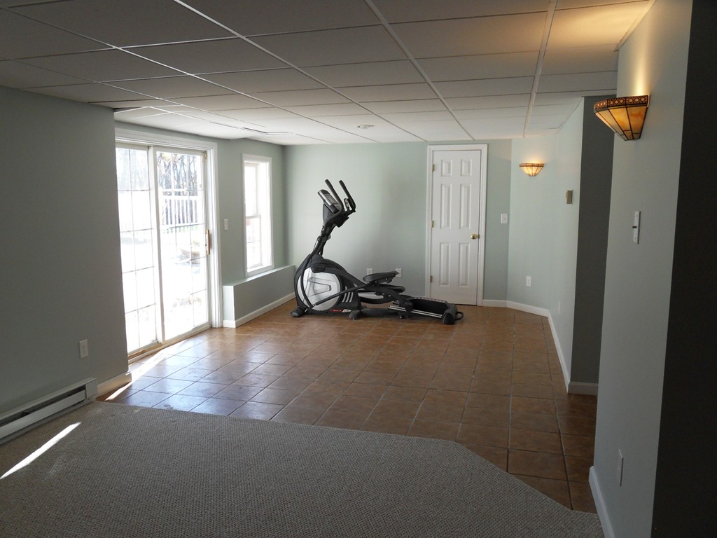 99 Freeman Road Charlton, MA 01507 - Photo 21 of 29 a view of a room with gym equipment