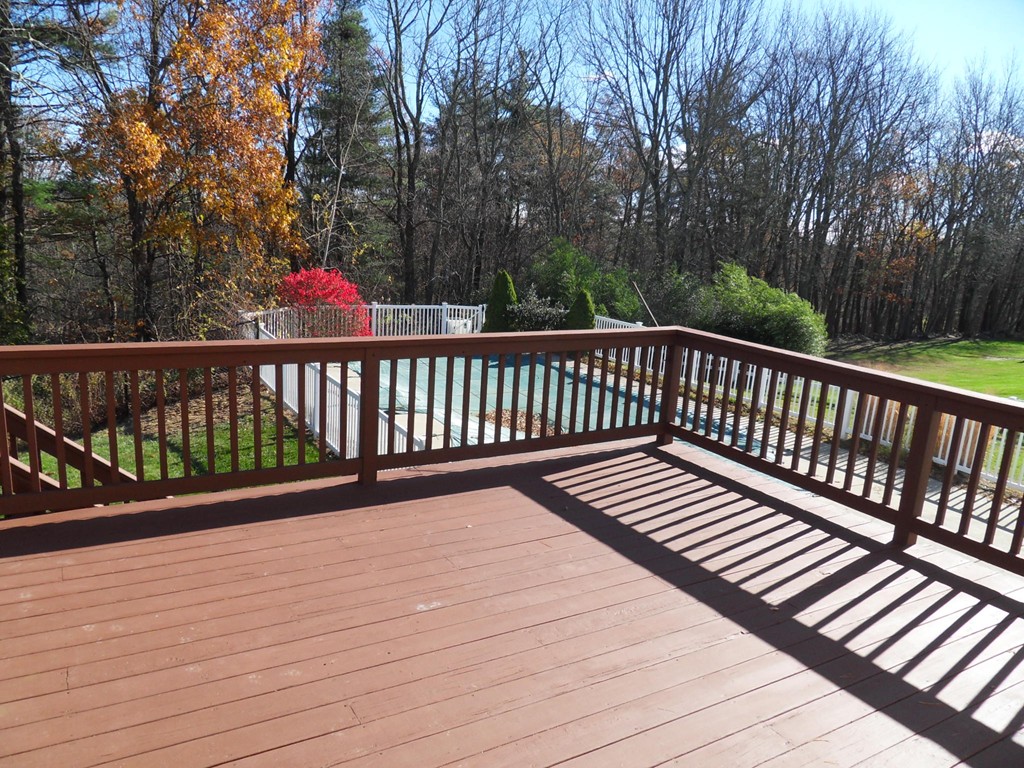 99 Freeman Road Charlton, MA 01507 - Photo 22 of 29 a view of deck with trees