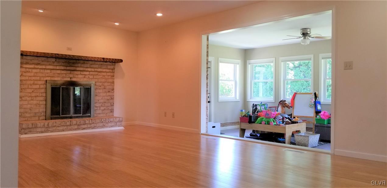3506 Gun Club Road Nazareth, PA 18064 - Photo 16 of 16 a living room with furniture and a fireplace
