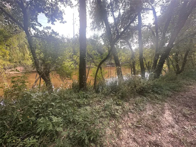 a view of outdoor space with a lake view