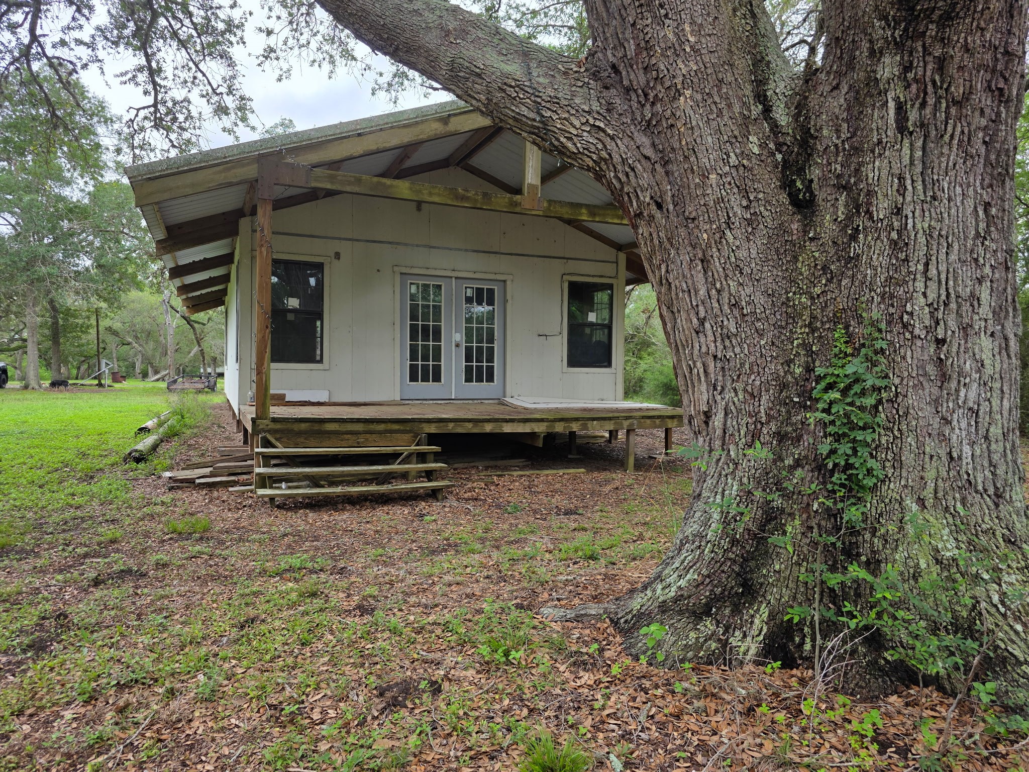 612 Byrd Salyer Road Bay City, TX 77414 - Photo 28 of 32 a backyard of a house with barbeque oven