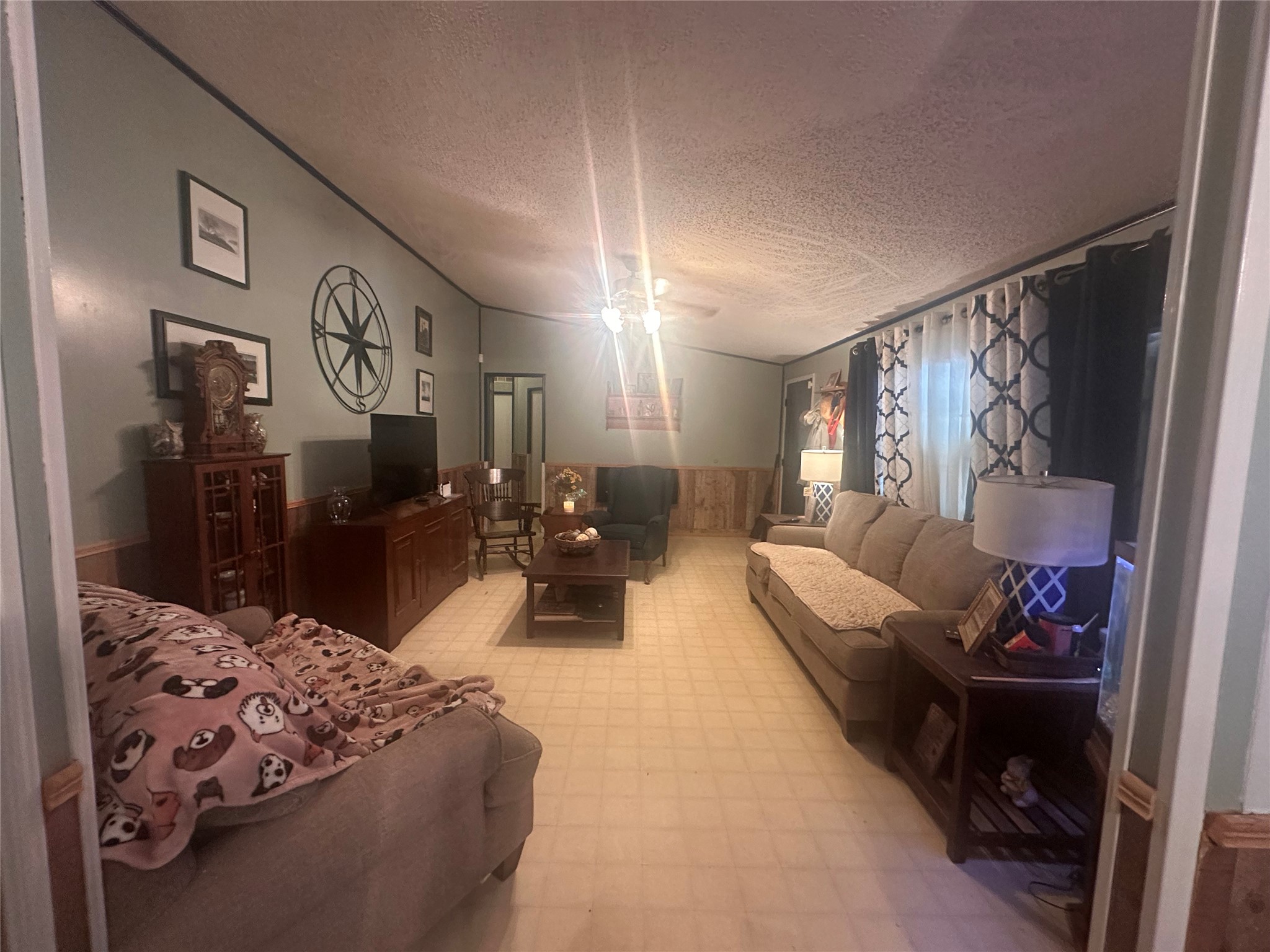 612 Byrd Salyer Road Bay City, TX 77414 - Photo 3 of 32 a living room with furniture and a flat screen tv