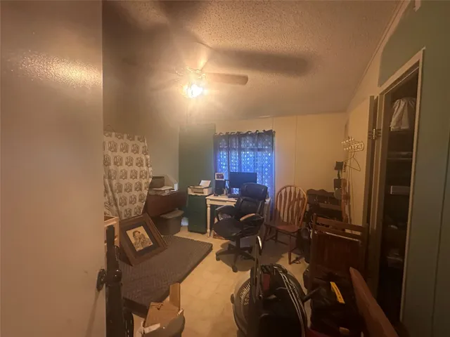 a workspace with furniture and a window