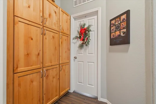 a view of an empty room with a garage