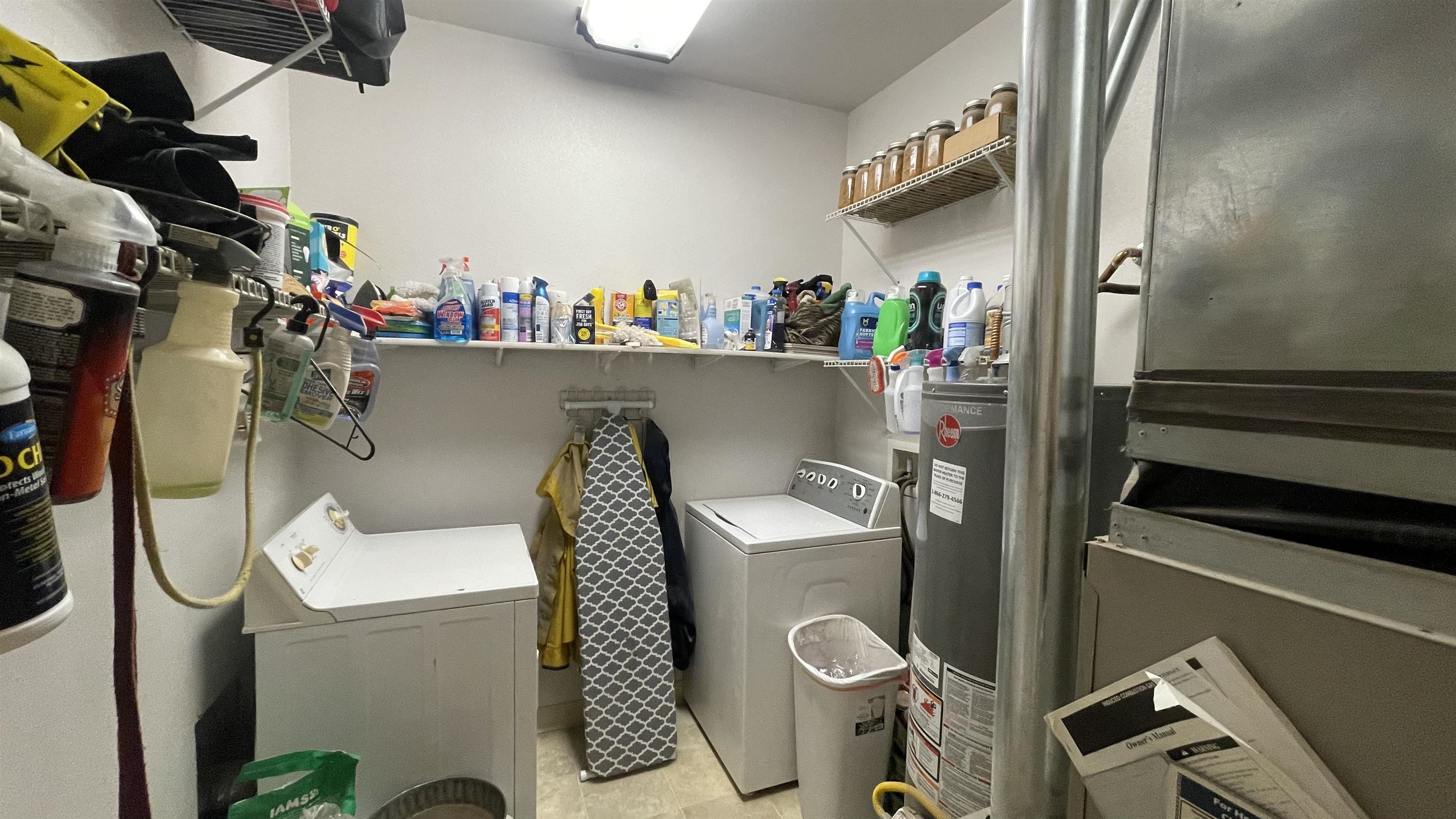 3049 F F 3/4 Road Grand Junction, CO 81504 - Photo 18 of 19 a utility room with dryer washer and a view of living room