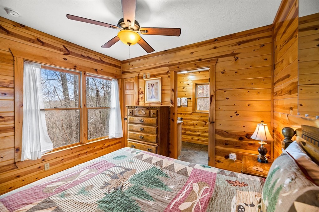 4130 Evans Chapel Road Sevierville, TN 37876 - Photo 23 of 33 a room with furniture and a window