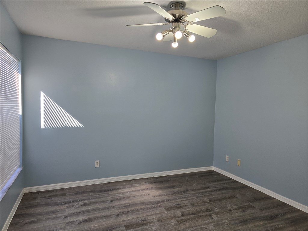 481 10th Place Vero Beach, FL 32960 - Photo 15 of 20 a view of an empty room with wooden floor