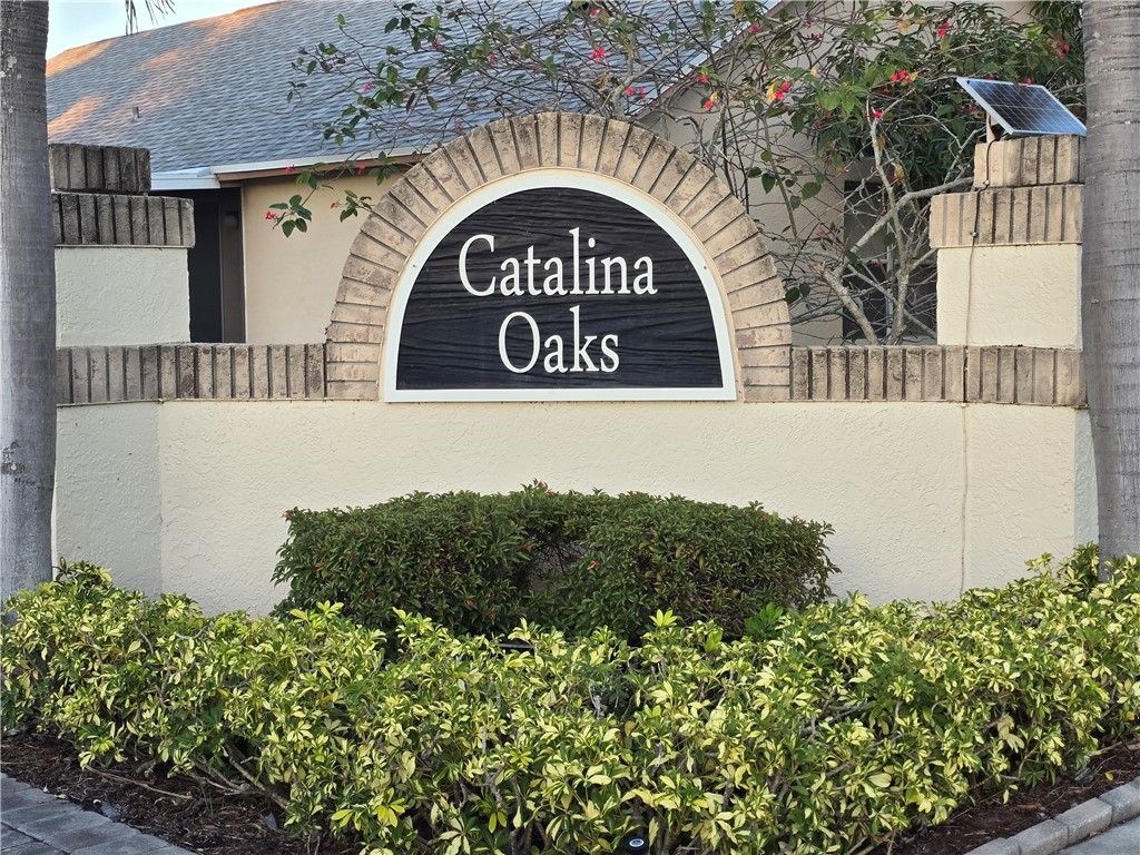 481 10th Place Vero Beach, FL 32960 - Photo 3 of 20 a view of outdoor space with signage and flags