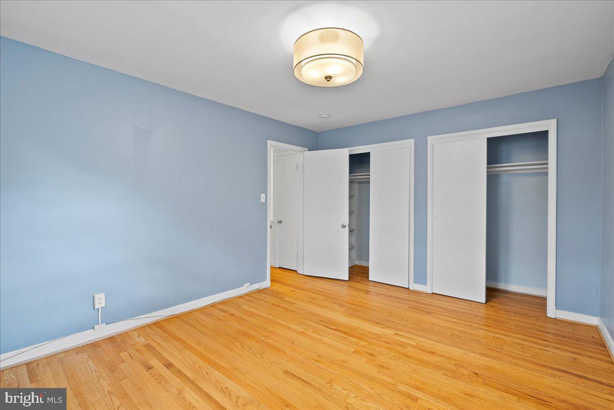 4411 Harrison Street Northwest Washington, DC 20015 - Photo 20 of 38 a view of a room with wooden floor