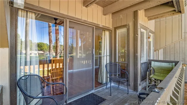 a view of a park with large trees