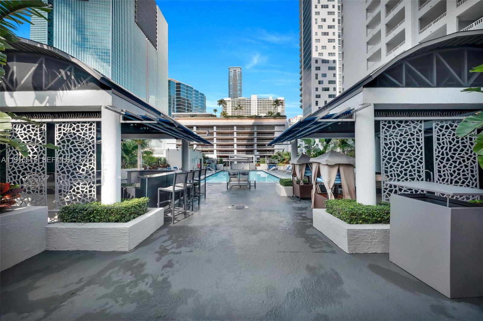 185 Southeast 14th Terrace, Unit 2008 Miami, FL 33131 - Photo 24 of 26 a view of a porch with seating space