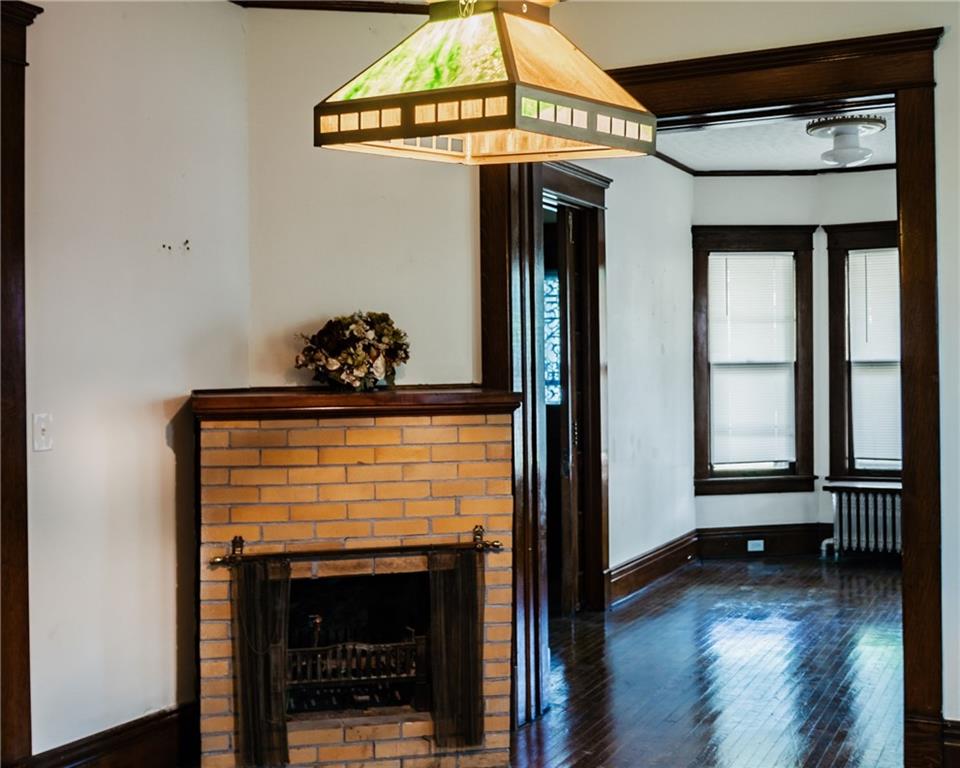 150 Euclid Avenue Sharon, PA 16146 - Photo 14 of 49 a view of fireplace and wooden floor