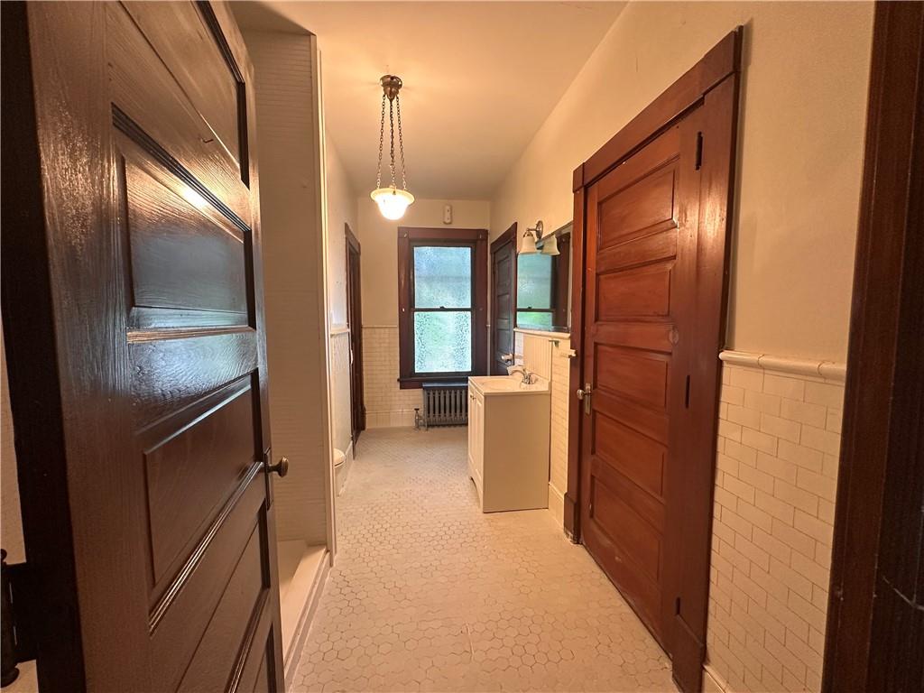 150 Euclid Avenue Sharon, PA 16146 - Photo 28 of 49 a view of a refrigerator and an empty room
