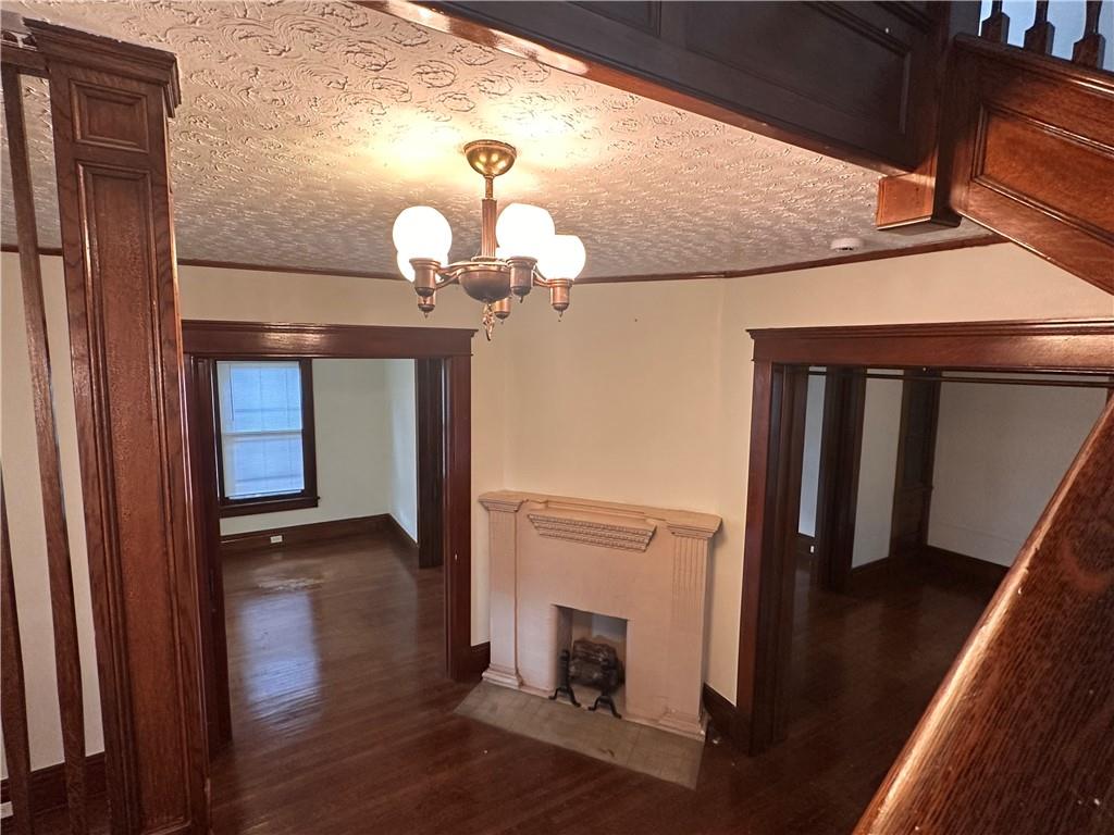 150 Euclid Avenue Sharon, PA 16146 - Photo 7 of 49 a view of a hallway with wooden floor and staircase