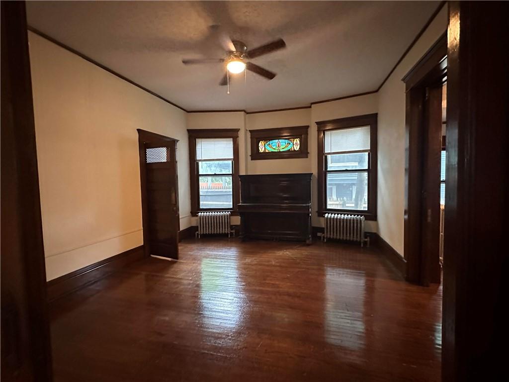 150 Euclid Avenue Sharon, PA 16146 - Photo 9 of 49 wooden floor in an empty room with a window