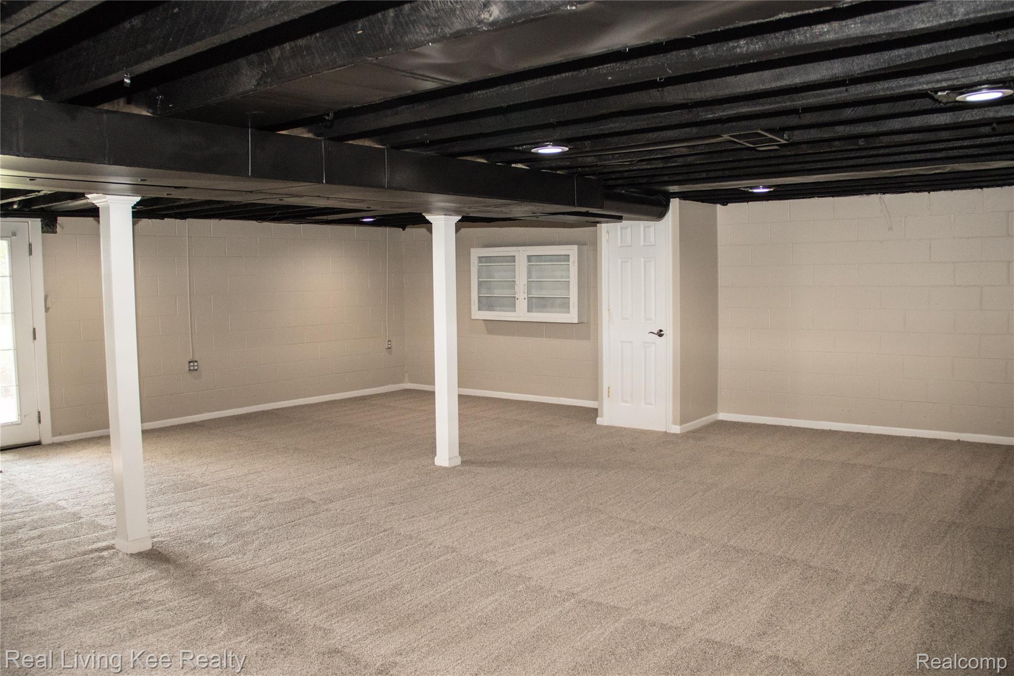 16475 Almont Road Allenton, MI 48002 - Photo 33 of 43 Finished basement 3.jpg