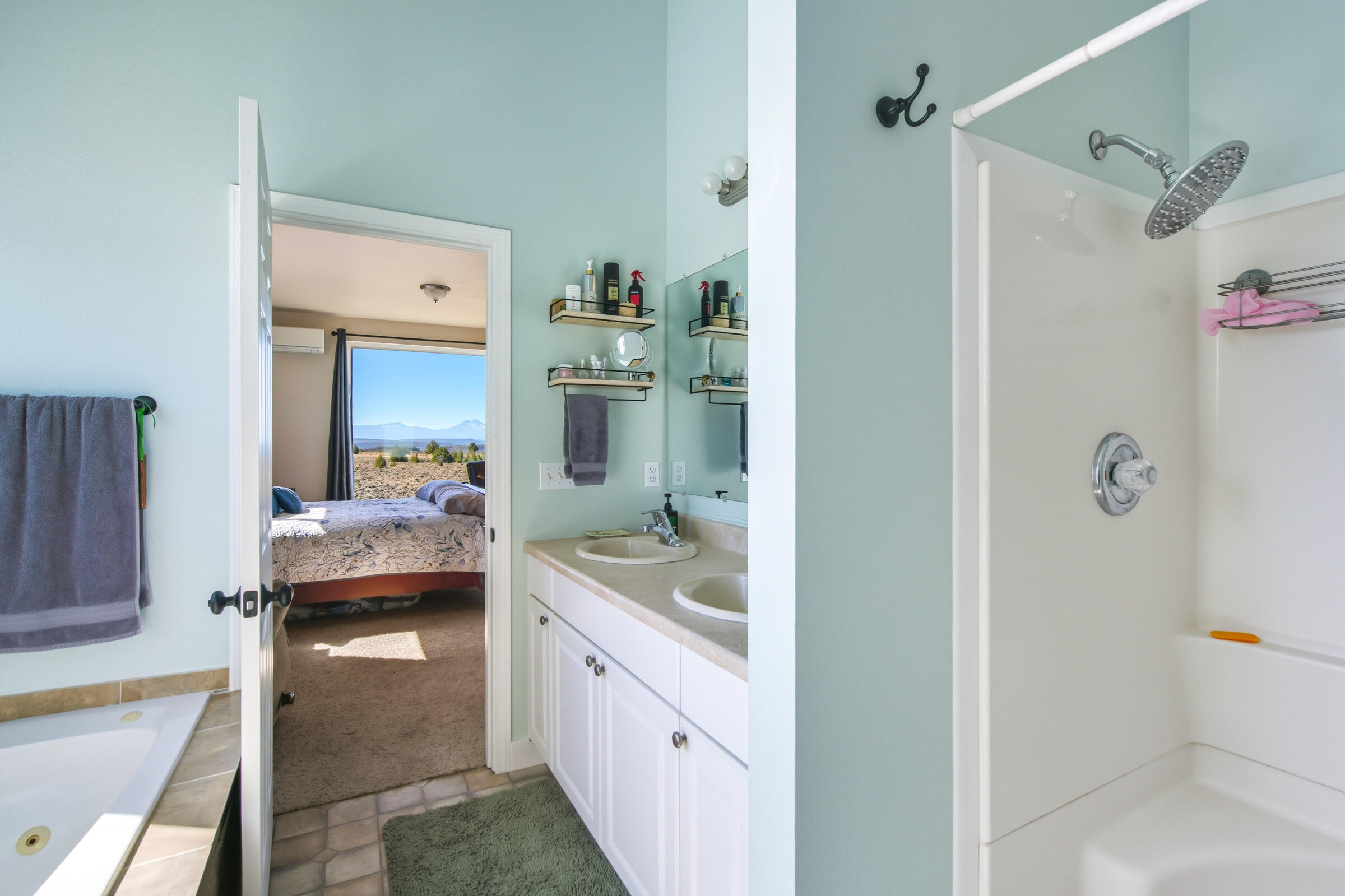 9813 Geneva View Road Terrebonne, OR 97760 - Photo 9 of 43 double vanity, shower/tub combo and jetted tub
