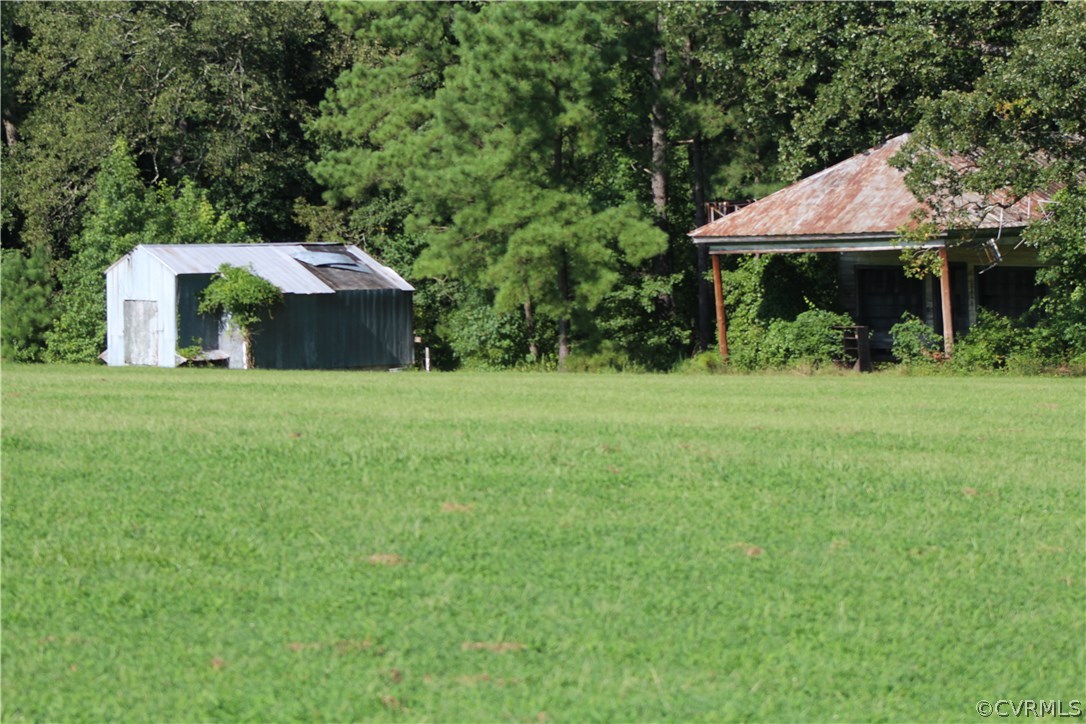 OLD BARN AND STORE ON PROPERTY.
