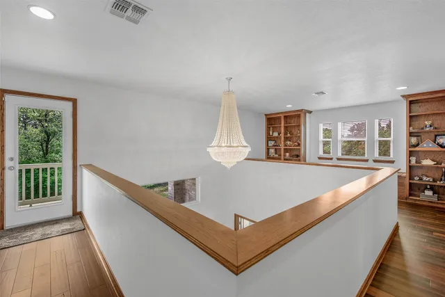 a view of living room with furniture and window