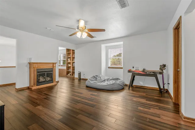 a room with furniture and a fireplace