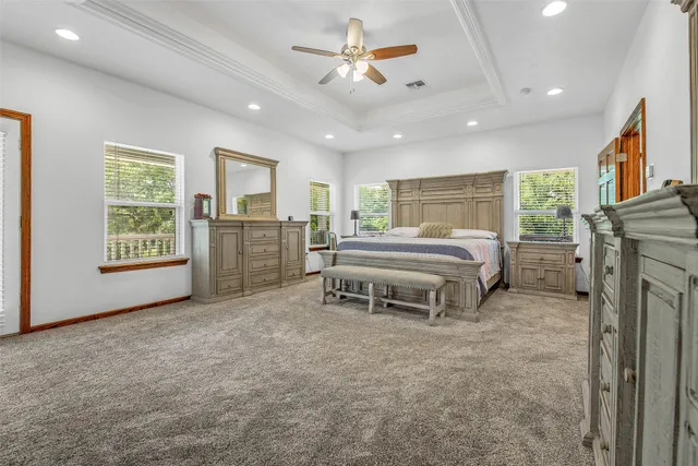 a bedroom with furniture and window