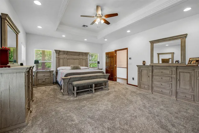 a bedroom with furniture and window