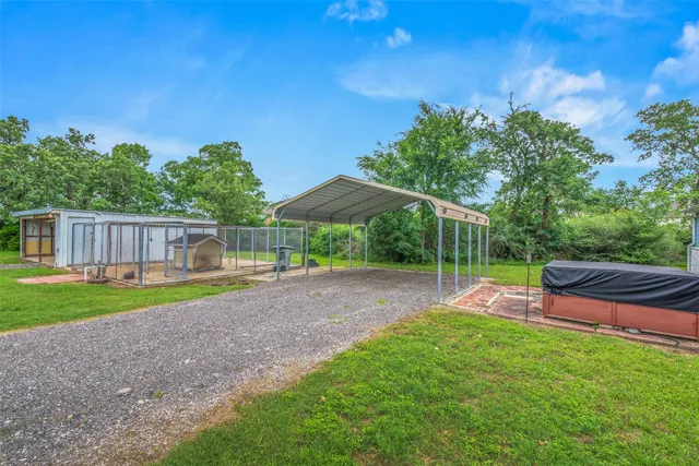 a car parked in the middle of a field