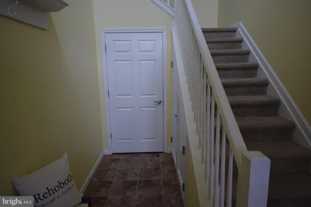 a view of hallway with stairs