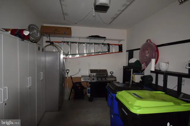 a workspace with furniture and a chandelier