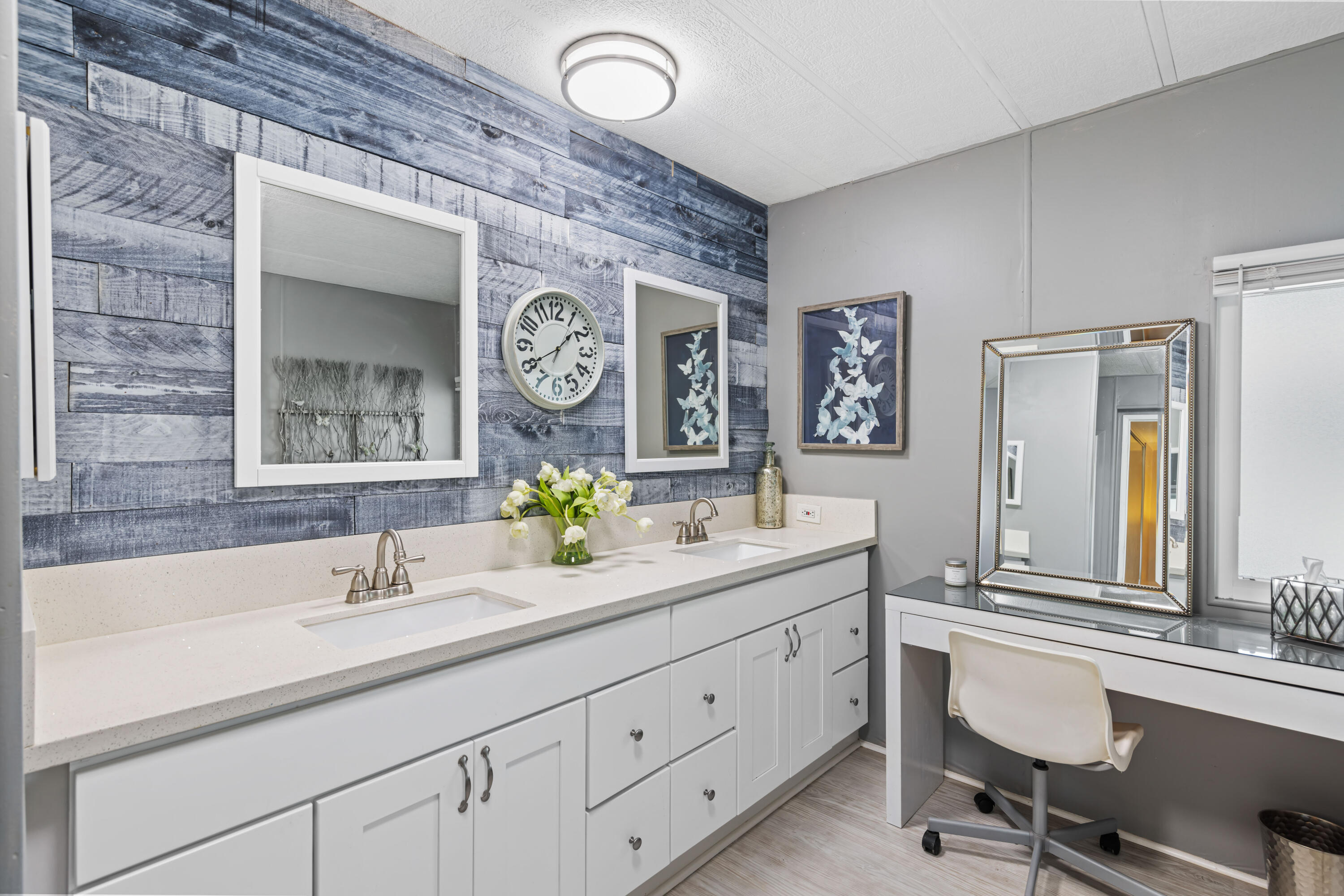 Undisclosed Address Palm Desert, CA 92260 - Photo 22 of 41 a en suite bathroom with a sink and a mirror