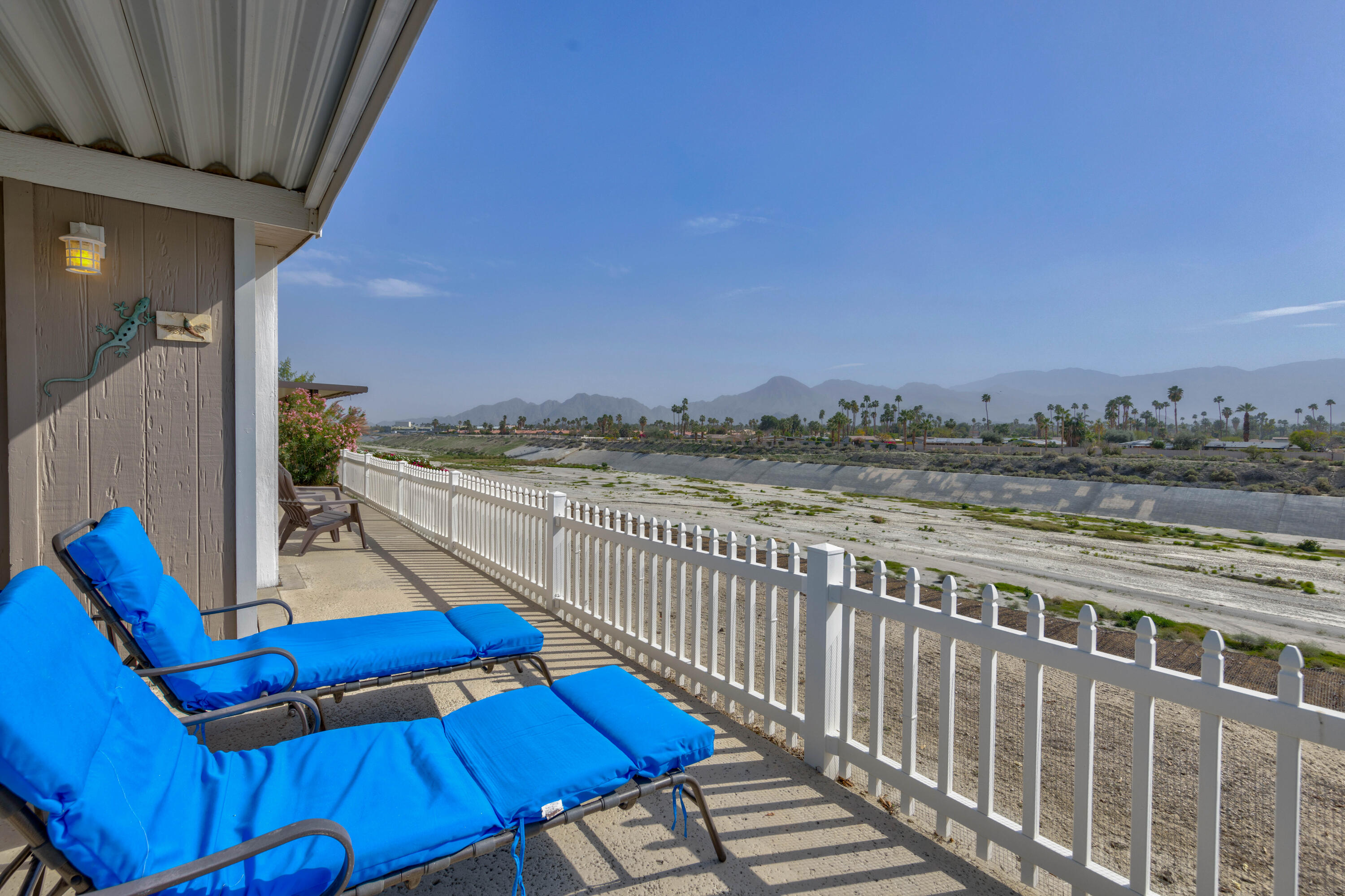 Undisclosed Address Palm Desert, CA 92260 - Photo 28 of 41 a view of a balcony with wooden floor and city view