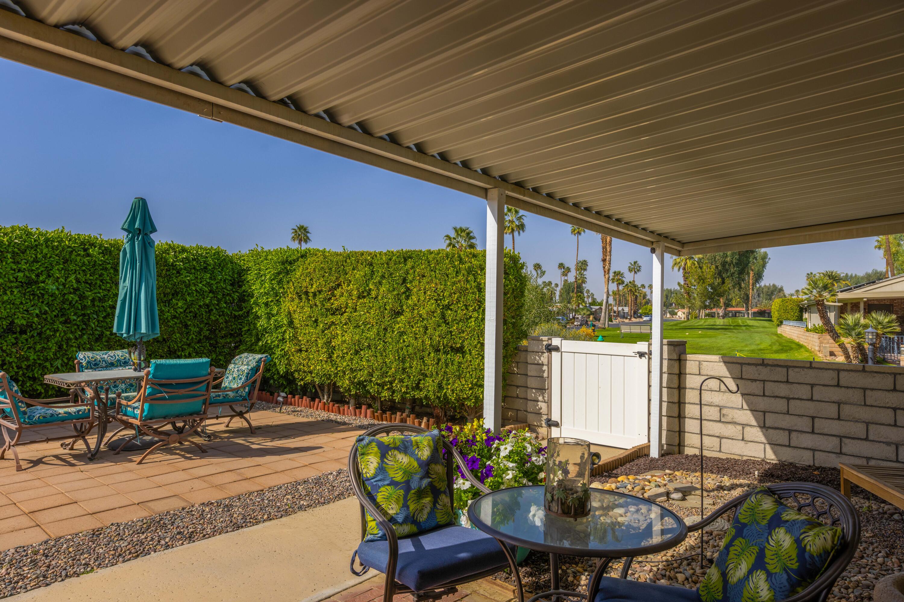 Undisclosed Address Palm Desert, CA 92260 - Photo 33 of 41 a outdoor dining space with furniture