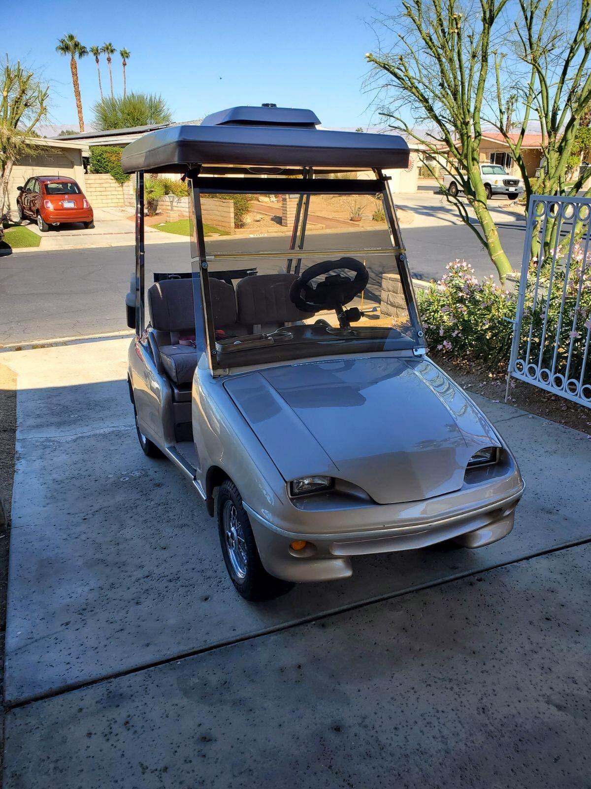 Undisclosed Address Palm Desert, CA 92260 - Photo 35 of 41 a car parked in the parking lot