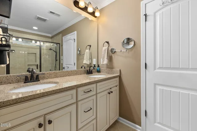 a bathroom with a tub and shower