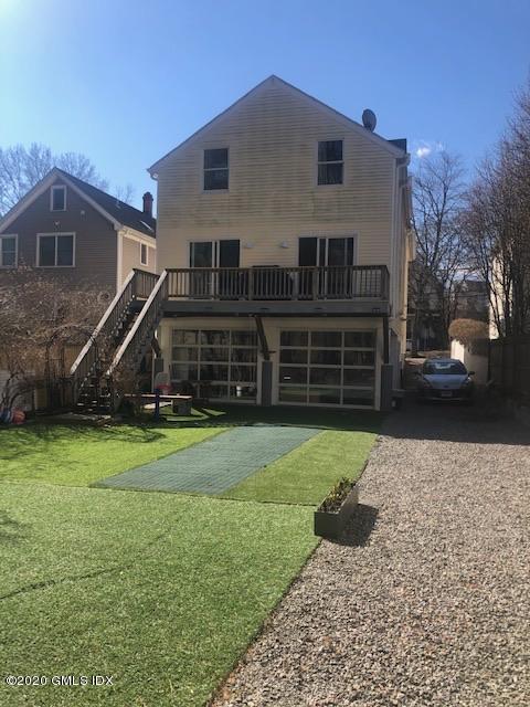 37 Prospect Street Greenwich, CT 06830 - Photo 36 of 41 a front view of a house with a yard